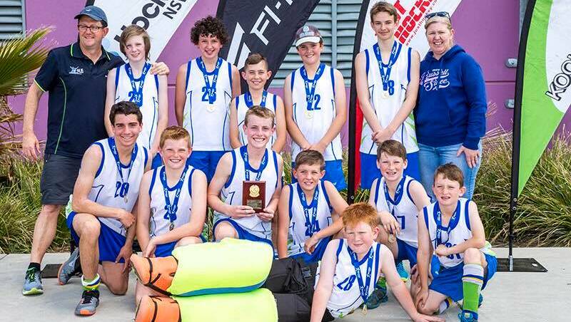 WE DID IT: Bathurst's under 13s boys celebrate their NSW Indoor Hockey Championships division three triumph at Orange. Photo: CLICK INFOCUS