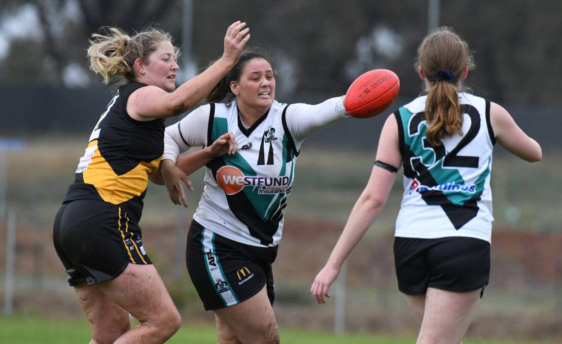 OPENING ROUND SUCCESS: Bathurst Bushrangers' Lauren Grundy contests for the ball in the team's AFL Central West win over Orange Tigers at Waratahs on Saturday. Photo: JUDE KEOGH