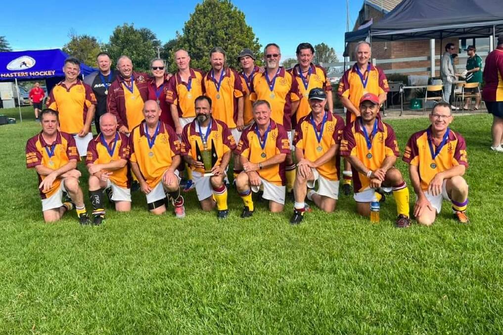BACK TO THE TOP: Bathurst celebrates their Hockey NSW Men's Masters Over 50s division B title, which they won on their home turf on Sunday. Photo: CONTRIBUTED