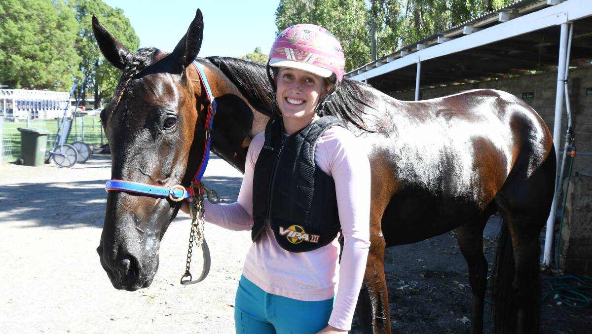 WINNING SMILE: Isobel Ross and Bid For Red claimed a victory for Steve Turnbull in Sunday's Kevin & Kay Seymour Ladyship & Lady Drivers Pace (1609 metres) at Orange’s Towac Park. Photo: CARLA FREEDMAN