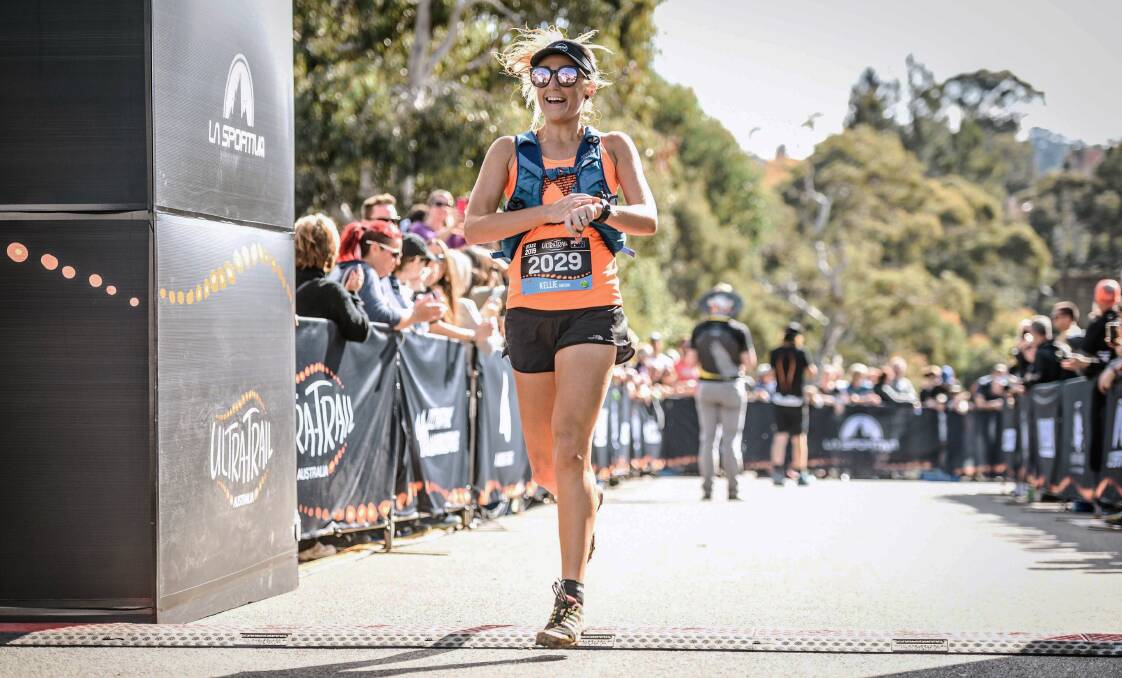 LAST STEP: Bathurst'S Kellie Gibson crosses the line to finish 131st in a field of over 2,100 UTA 22km runners. Photo: SPORTOGRAF