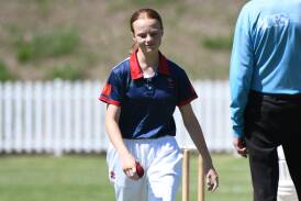 Lily Railz walks back to the mark while bowling in Sunday's win for the Western Girls over Mudgee. Picture by James Arrow.