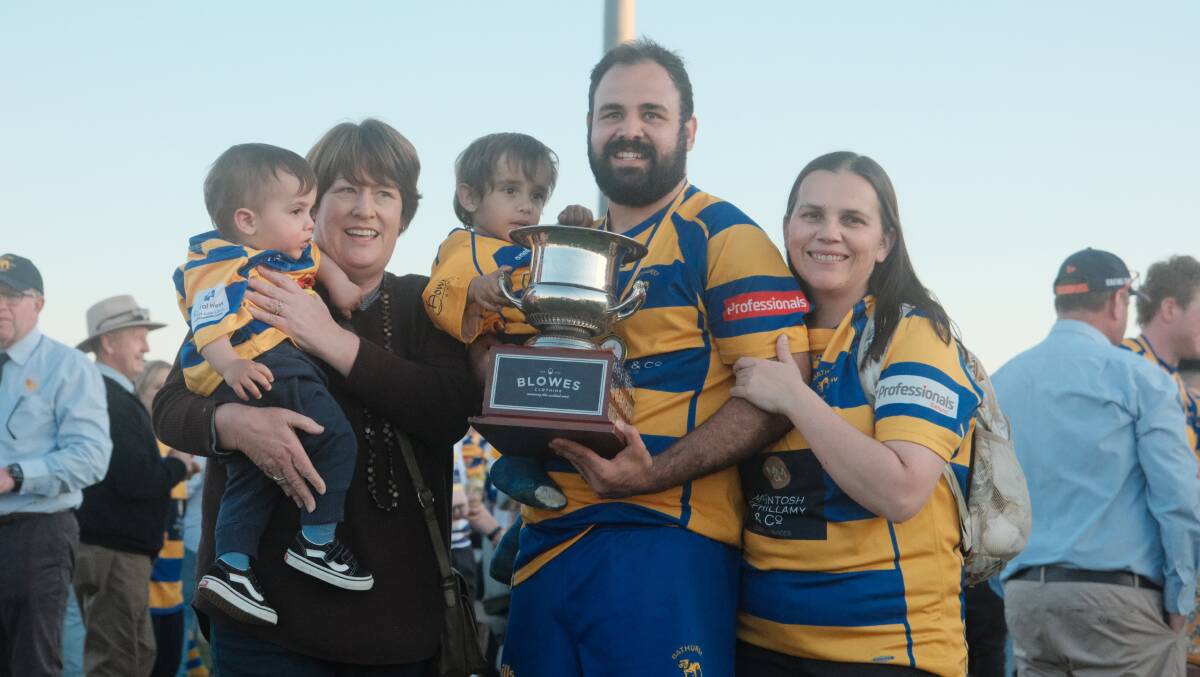 Peter Fitzsimmons with his family following Saturday's win. Picture by James Arrow.