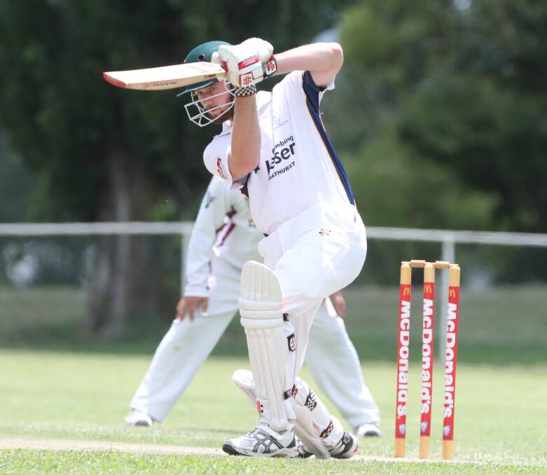 PUNCHED BACK: Ethan Ivory plays a straight drive back down the ground in St Pat's Old Boys' win over Bathurst City on Saturday. Photo: PHIL BLATCH