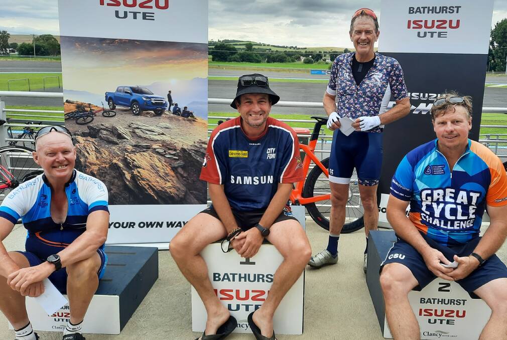 PODIUM: Winner Darren Fenton (centre) flanked by Glen Partridge (third) and Gary Hamer (second) with Mark Windsor, who rode the fastest time.