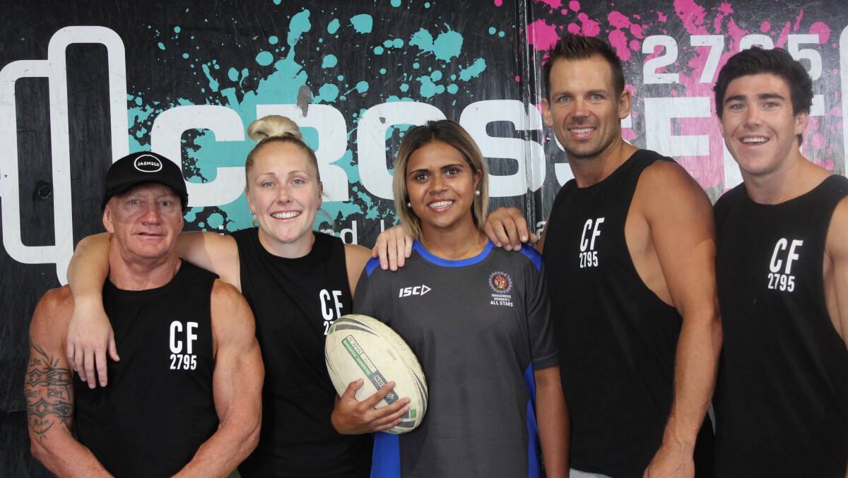 BACK AGAIN: Kandy Kennedy (centre) will attempt to guide the Women's Indigenous All Stars side to victory on Friday night in Newcastle.