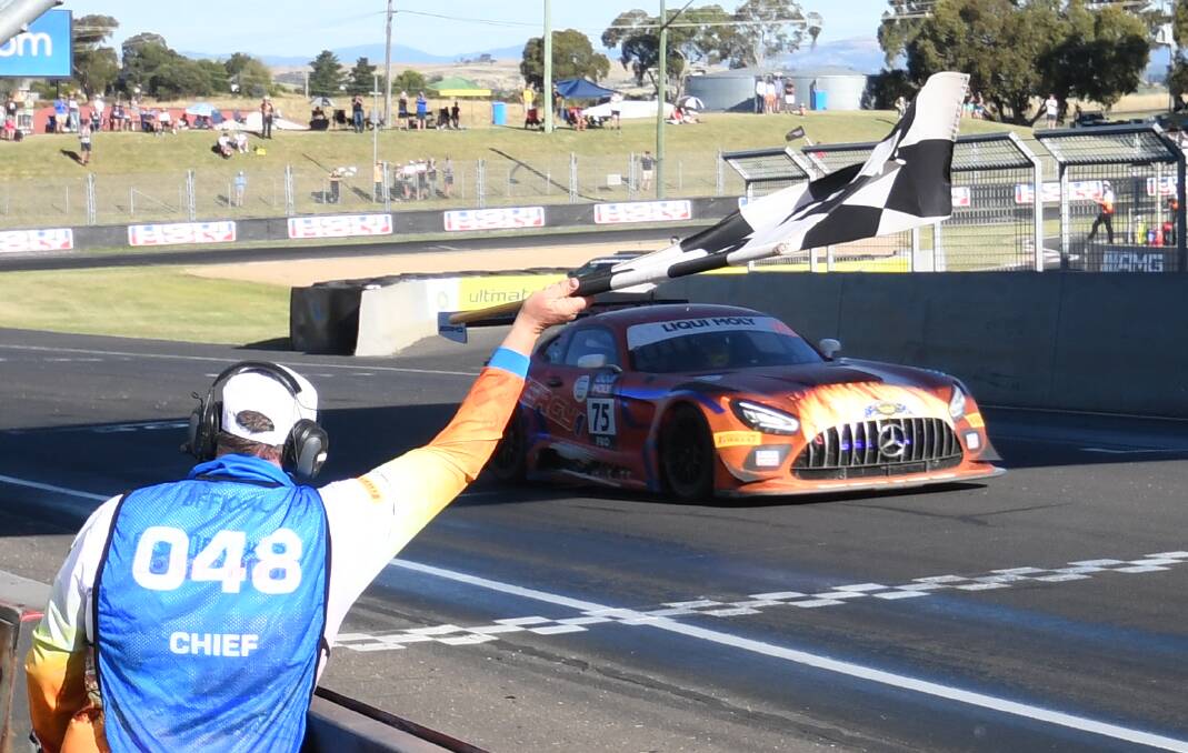 Jules Gounon takes the chequered flag to win a dramatic edition of the Bathurst 12 Hour on Sunday. Picture by Chris Seabrook.