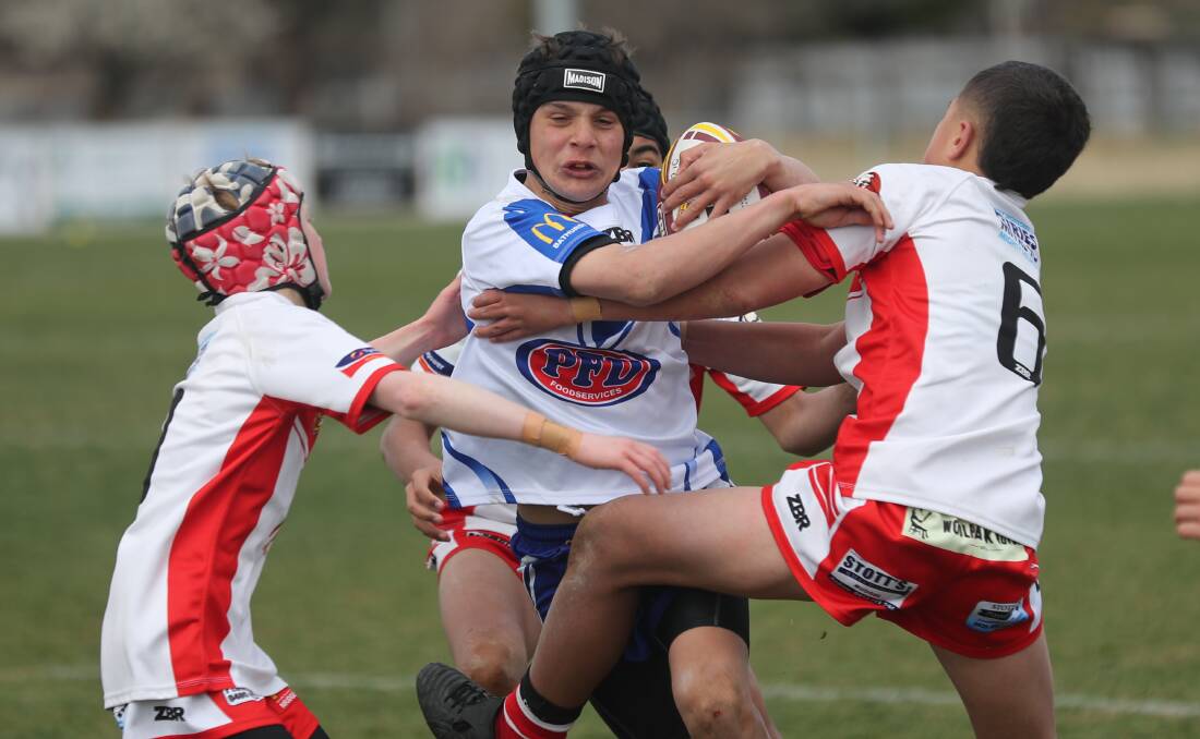 FOOTY'S CLOSE: St Pat's junior rugby league players will still enjoy eight regular season matches this season. Photo: PHIL BLATCH