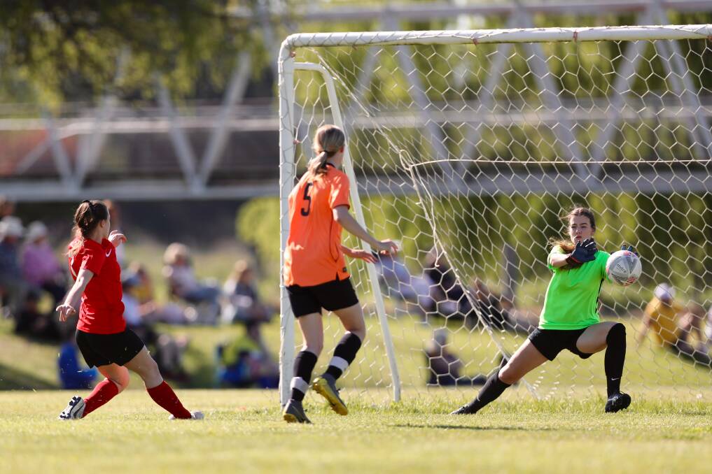GOAL TIME: Courtney Hayter puts this shot away for Panorama FC during Sunday's game. Photo: PHIL BLATCH
