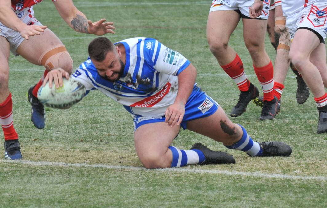 BACK-TO-BACK WINS: St Pat's captain Zac Merritt crosses for a try in his side win over Mudgee Dragons on Sunday at Wade Park. Photo: CARLA FREEDMAN