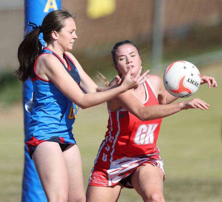 IN THE LEAD: Lucy Rowe (left) and her Scots All Saints College side are top of A reserve grade. Photo: PHIL BLATCH