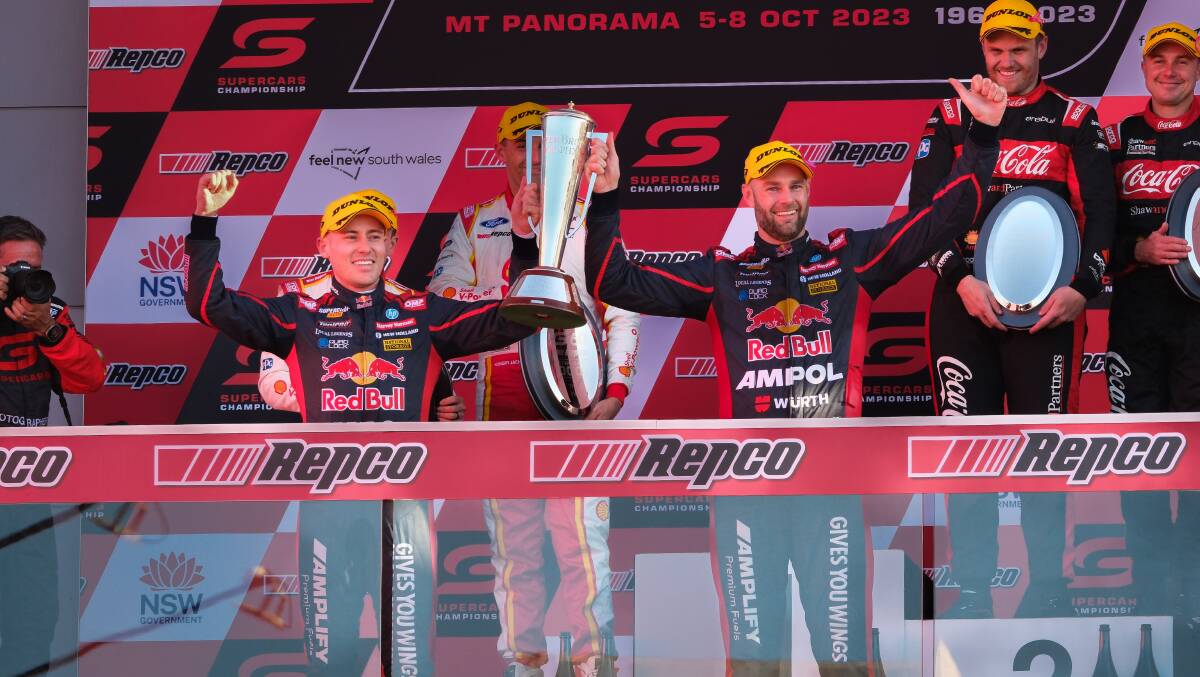 Richie Stanaway and Shane van Gisbergen hold the Peter Brock Trophy. Picture by James Arrow.