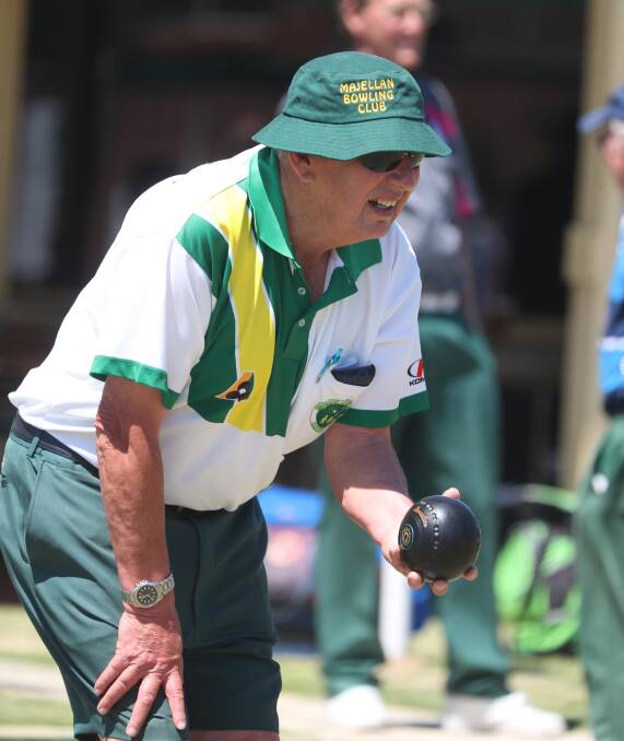 LINE THEM UP: Kevin Howard prepares to bowl during a recent round at the Majellan Bowling Club. Photo: PHIL BLATCH