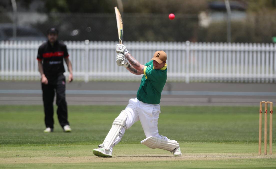 AWAY IT GOES: Joel Gurney slashes a shot towards the covers during his innings against Bathurst City. Photo: PHIL BLATCH