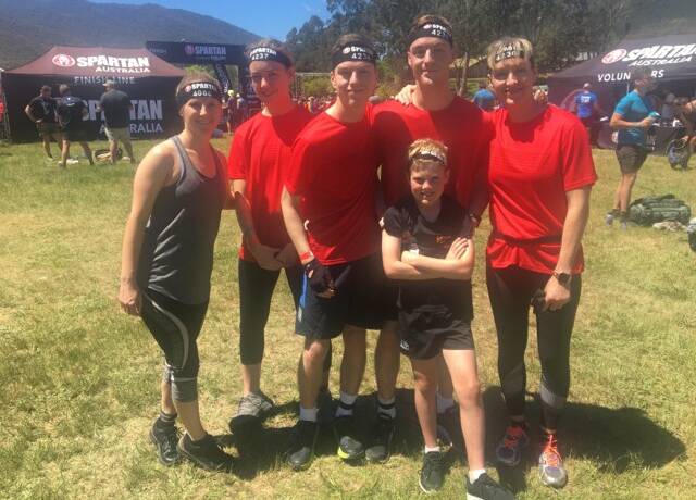 TOP STUFF: Amanda Breen, Amber Gay, Aaron Gay, Brodie Gay and (front) Tyler Breen completed the Spartan Sprint course in Victoria. Photo: CONTRIBUTED