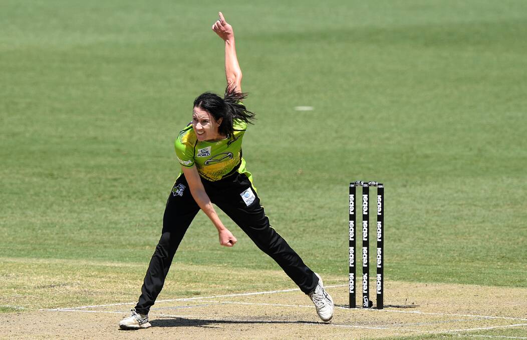 FINALS AWAITS: Lisa Griffith sends down a delivery for the Sydney Thunder in Tuesday's match against the Melbourne Renegades. Photo: AP