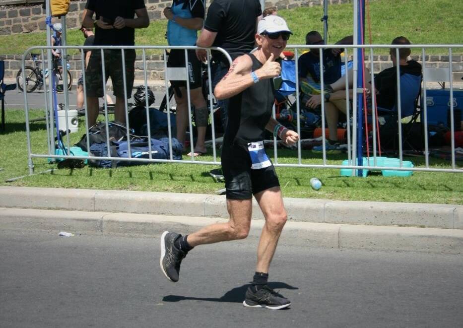 THUMBS UP: Chris Grady manages a smile for the camera during the run. Photo: CONTRIBUTED