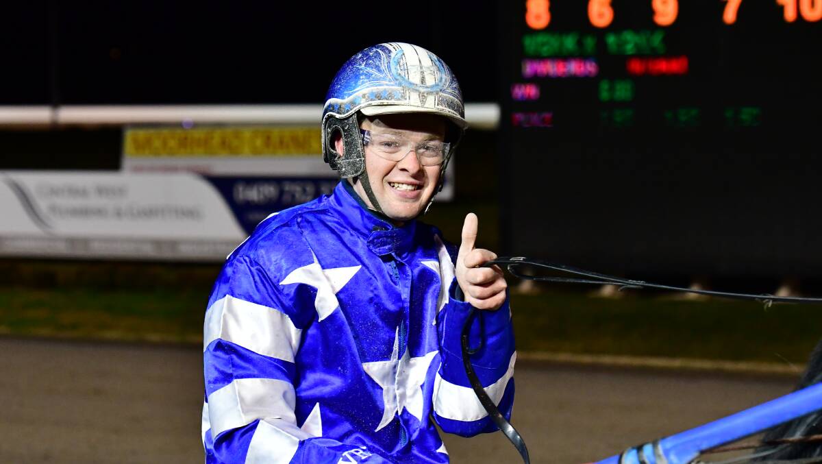 THUMBS UP: Tom Pay drove home Authoritative to victory at Wednesday night's meeting at Bathurst Paceway. Photo: ALEXANDER GRANT