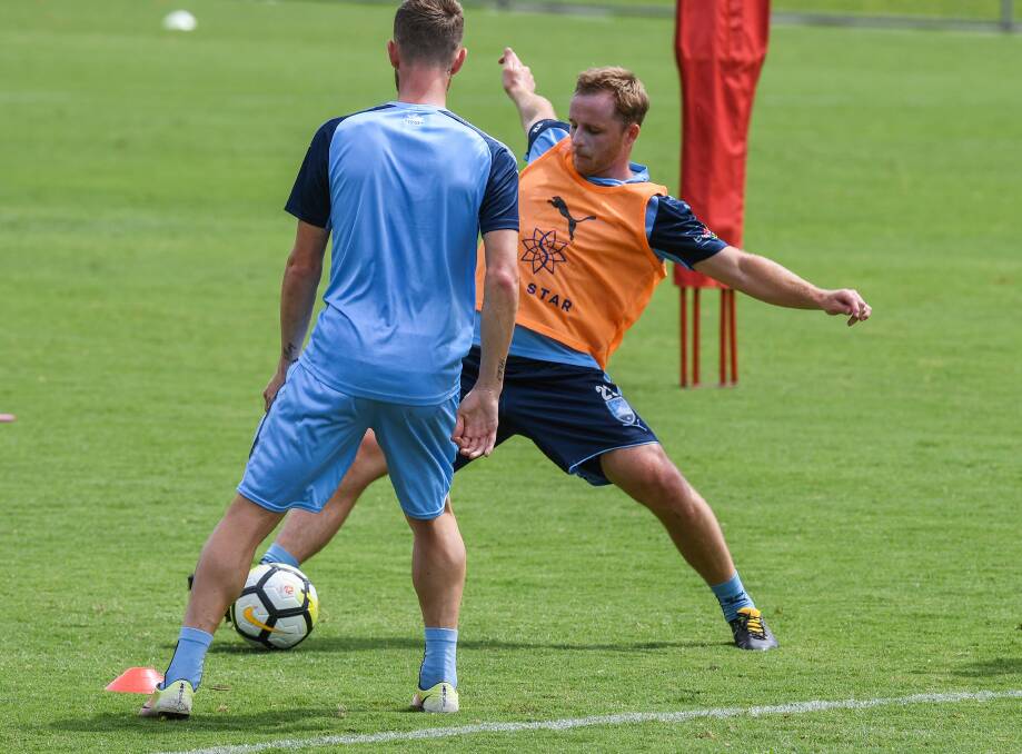 HE'S BACK: Rhyan Grant takes part in his first training session with Sydney FC since returning from an ACL injury. Photo: BRENDAN ESPOSITO