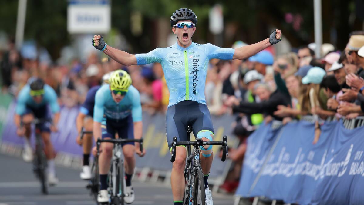 JUBILANT: Nick White celebrates as he crosses the line to win the Road Nationals under 23s road race. Photo: AMY MCCANN