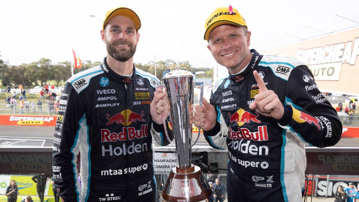 WHAT A DAY: Shane van Gisbergen and Garth Tander proudly display the Peter Brock Trophy following last year's Bathurst 1000 success.