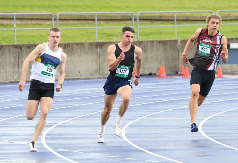 GOLD: Zen Clark (centre) on his way to victory in the 200 metres at state. Photo: FRED ETTER