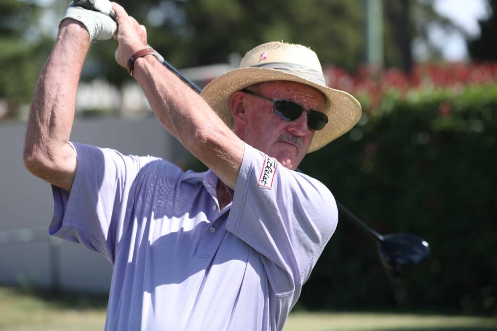 DOWN THE MIDDLE: Tony Pryce drives off the opening tee at the Bathurst Golf Club on Saturday. Photo: PHIL BLATCH