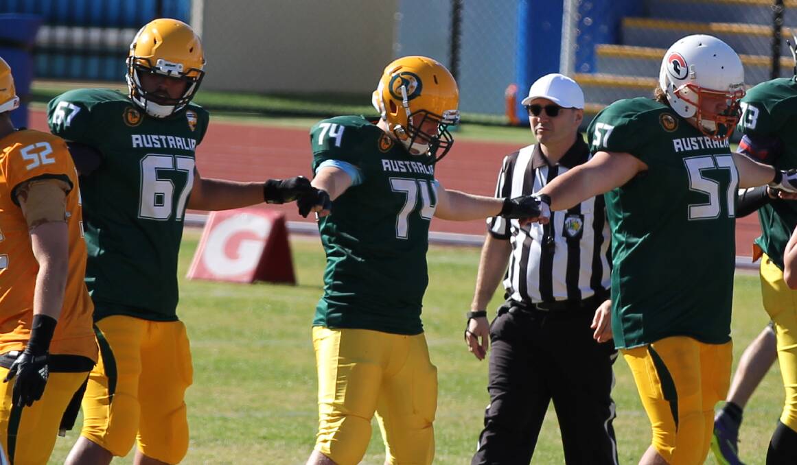 MEXICO BOUND: Jacob Edwards (centre) has booked a spot on the Australian team for the IFAF Under 19s World Cup.