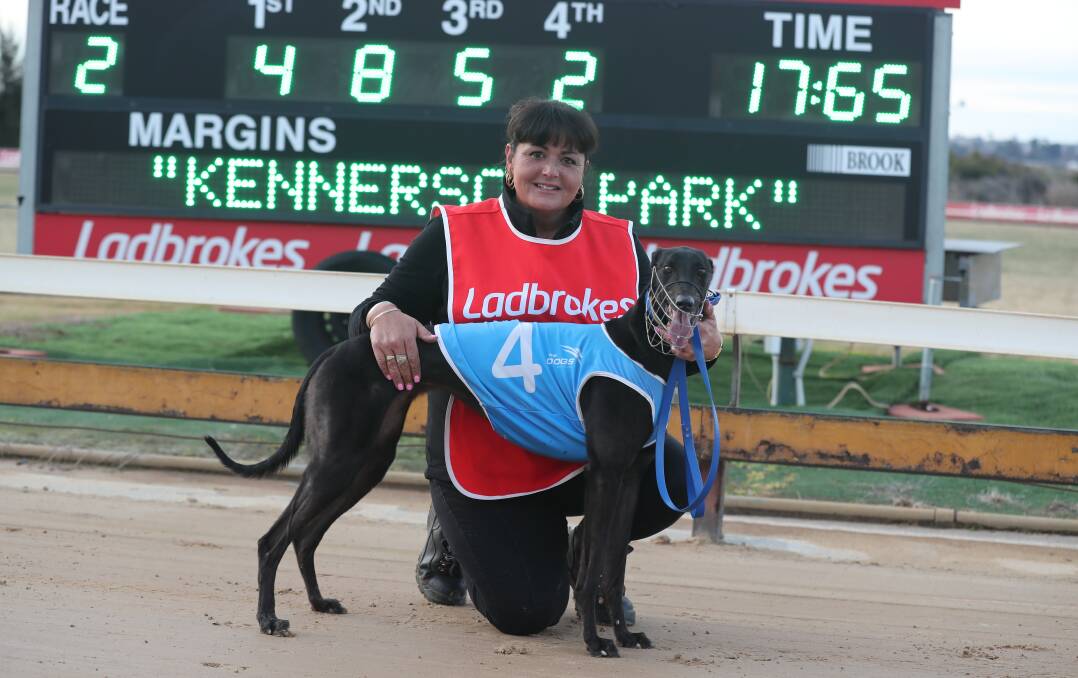 FLYING: Amanda Ginn with her winning bitch Red Azalea at Kennerson Park. Photo: PHIL BLATCH