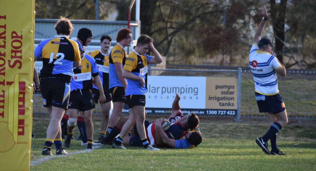 WORKING OVERTIME: Another Mudgee Wombats try is awarded during Saturday's match. CSU were fortunate to return home with a win after going through one of their toughest performances of the season. Photo: JAY-ANNA MOBBS