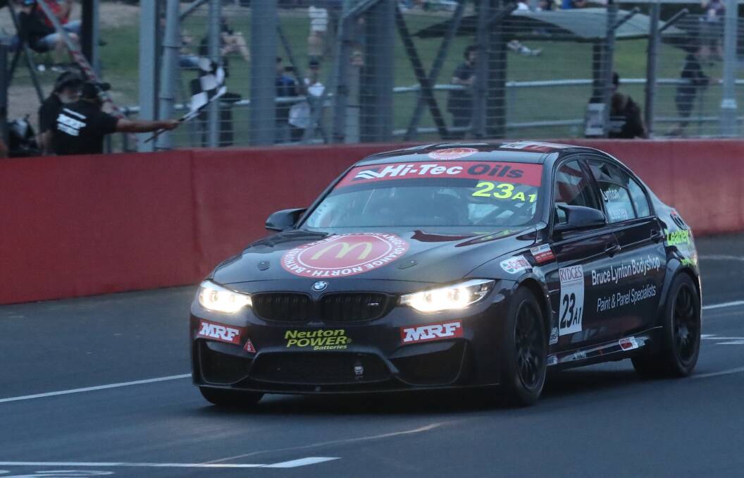 STUNNING WIN: Tim Leahey drives his #23 BMW M3 across the finish line to win Sunday's Bathurst 6 Hour. Photo: PHIL BLATCH