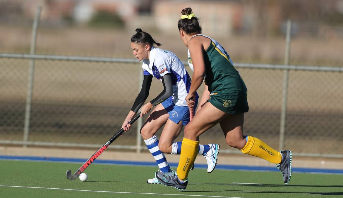 DOWNED: Millie Fulton on the burst for St Pat's against CYMS at Bob Roach Field. Photo: PHIL BLATCH