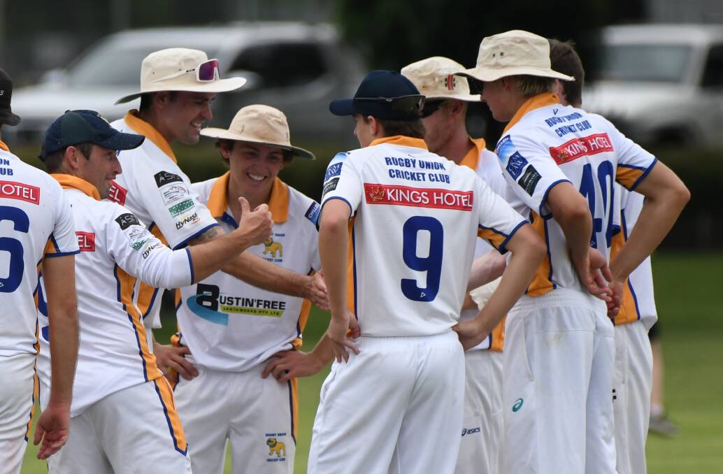 A happy Rugby Union squad celebrates a wicket during Saturday's game with Bathurst City. Picture by James Arrow.