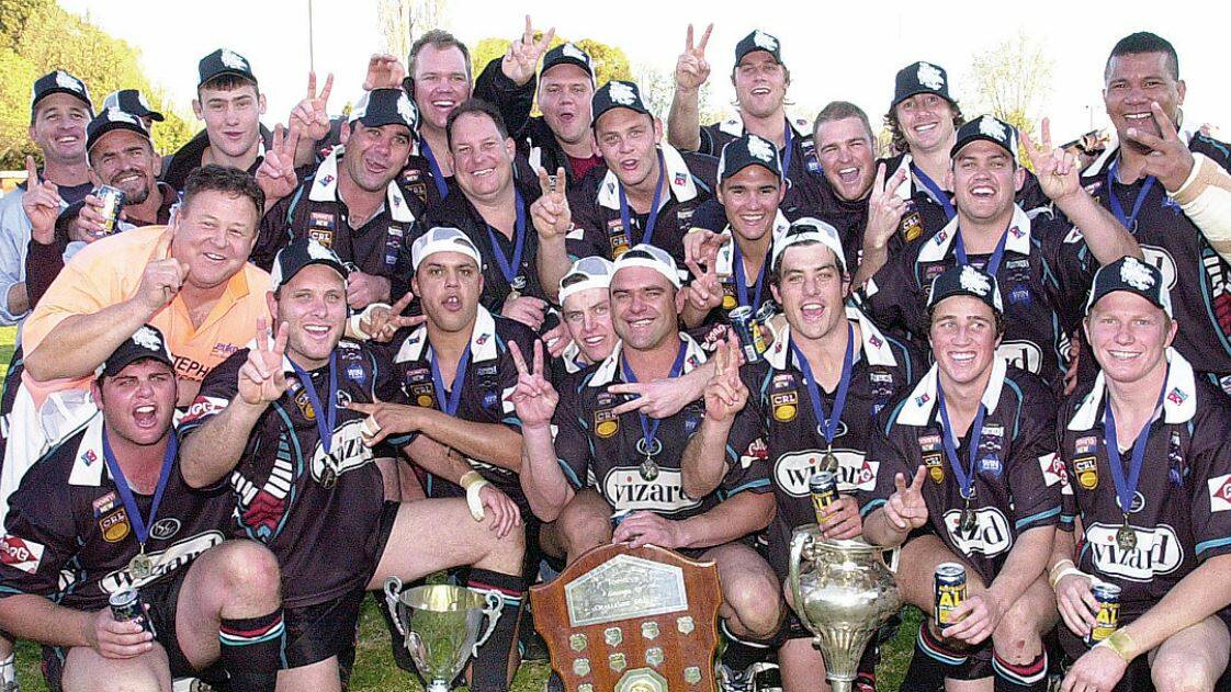 WHAT A MOMENT: The premiership-winning Bathurst Panthers team of 2007 celebrate after their success against the Lithgow Workies. Photo: CHRIS SEABROOK