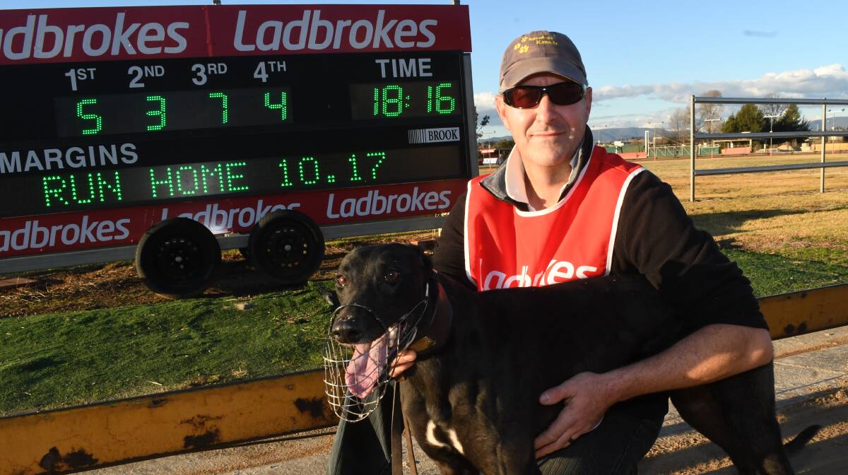 LUCKY WIN: Young-based trainer Gordon Herbert with his winner Dreamtime Vision at Kennerson Park on Monday. Photo: CHRIS SEABROOK