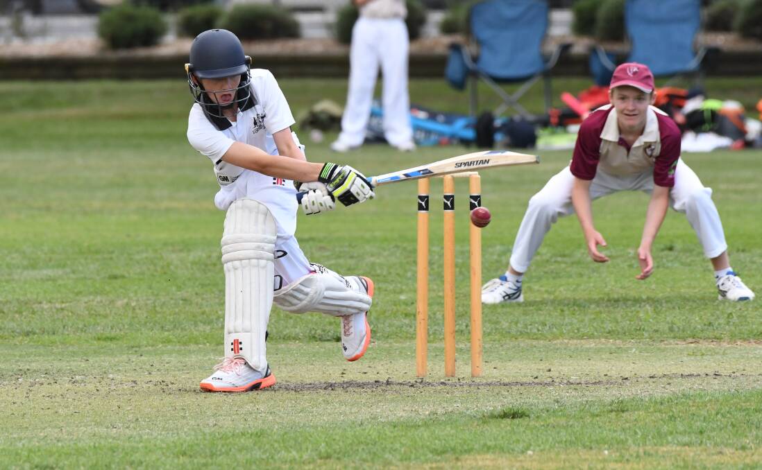 HELPING IT ON: Bathurst's Angus Parsons looks to flick the ball away to leg side during Sunday's game against Macquarie. Parsons top scored for Mitchell during a tough chase at home. Photo: CHRIS SEABROOK