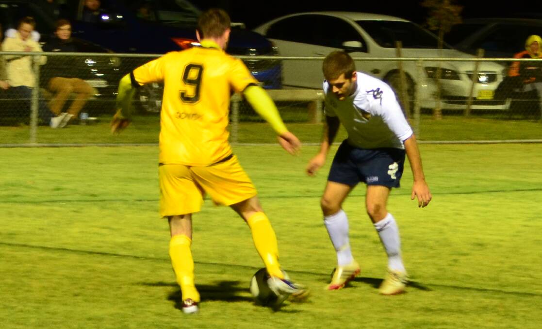 MOMENTUM: Duncan Logan (right) and the Western NSW Mariners FC men are celebrating a second win in the space of three games. Mariners were 2-1 winners over Inter Lions on Saturday. Photo: ANYA WHITELAW