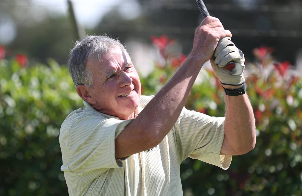 AVOIDING THE ROUGH: Jeff Williams watches his shot fly off the tee at Bathurst Golf Club. Photo: PHIL BLATCH