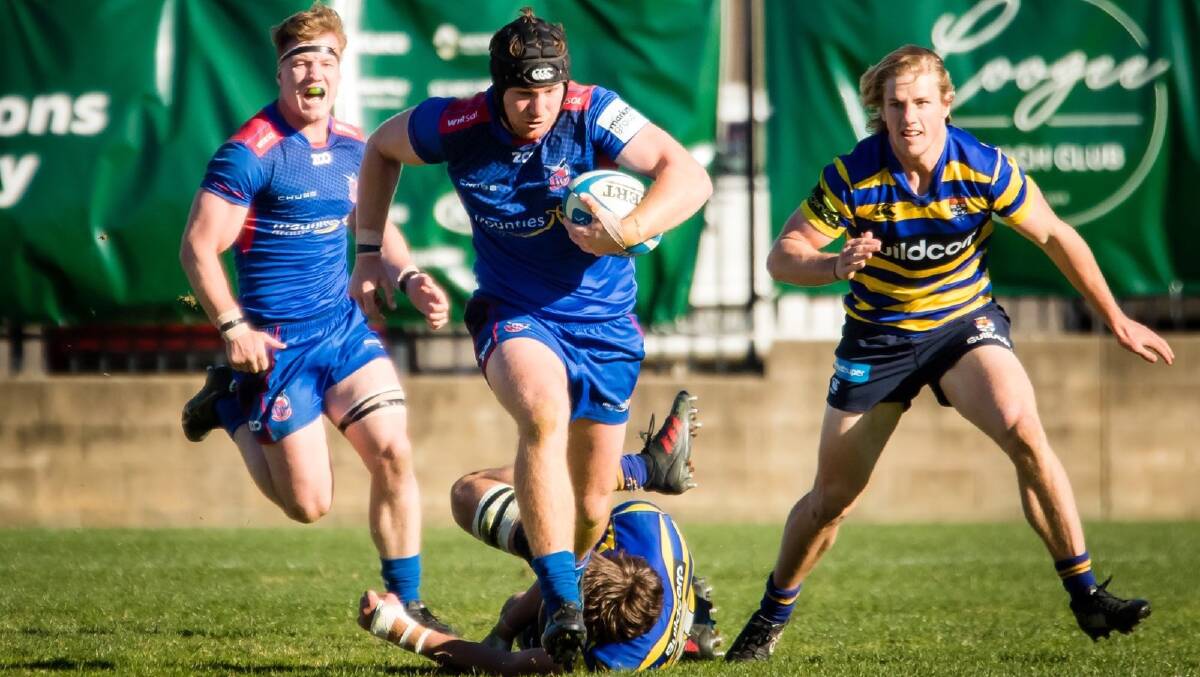 HEAD FULL OF STEAM: Two of the Central West's representatives in the Manly Marlins colts side, Felix Quinn (left) and Hunter Ward (centre), go up against Sydney University in the recent qualifying final.