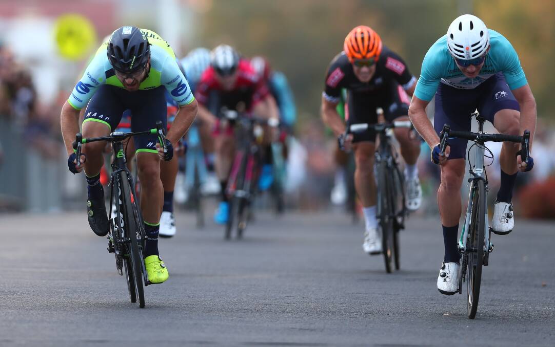 LAST PUSH: Cameron Scott (right) out-sprints Tristan Ward to the finish line in Saturday's Bathurst Cycling Classic men's division one criterium. Photo: PHIL BLATCH