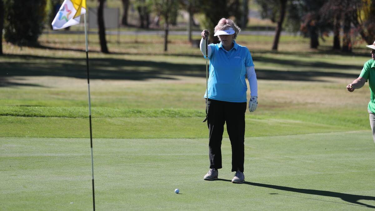 LINE IT UP: Jan Roughly prepares to putt during the recent Bathurst Ladies Open. Photo: PHIL BLATCH