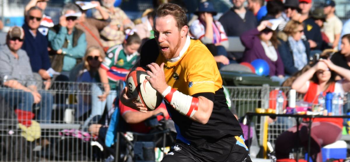 CHARGING: Fraser McCormack got himself onto the list of CSU try scorers in his side's win over the Mudgee Wombats. Photo: JAKE HUMPHREYS