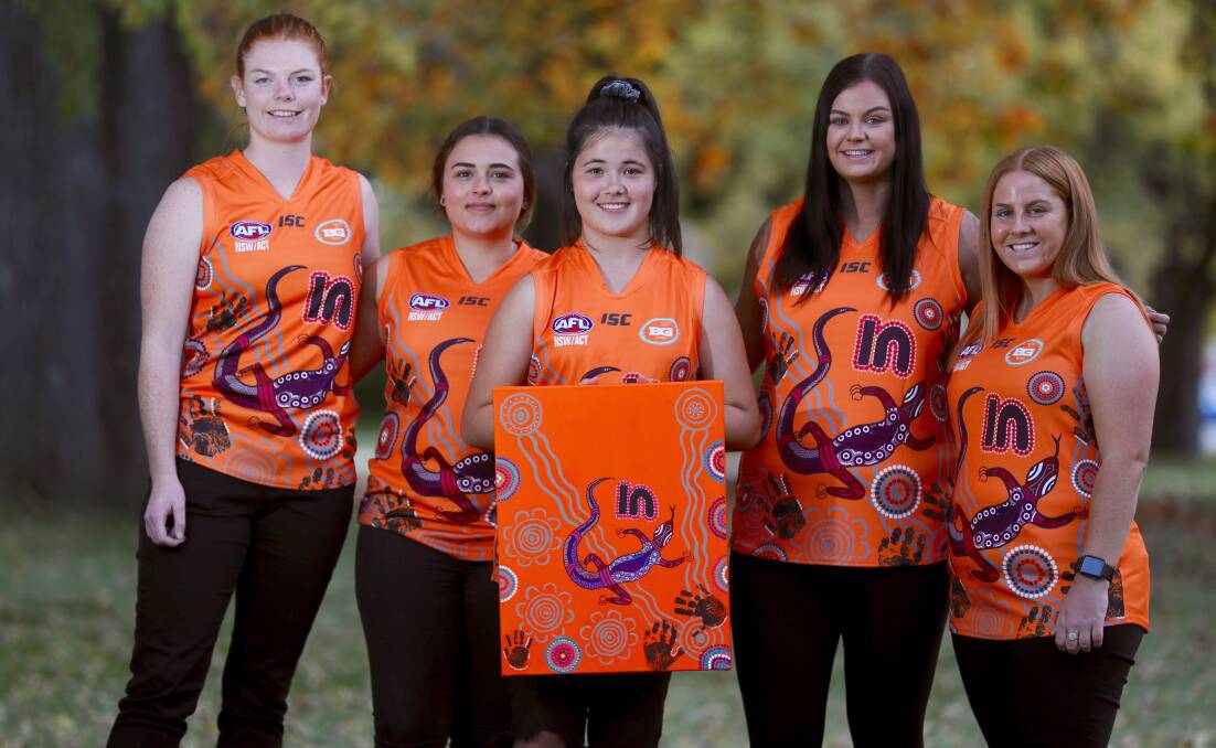 INDIGENOUS ROUND: Katie Kennedy, Maddy Booth, Dakota Nugent, Sarah Taylor and Hailee Provest in the Giants' jumpers. Photo: PHIL BLATCH