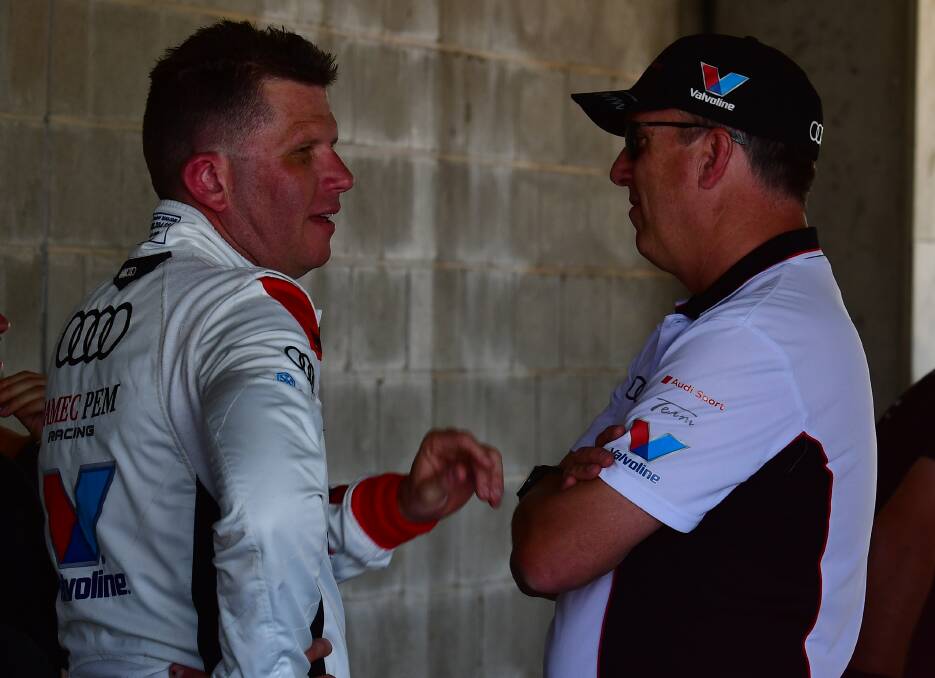 TEAM TALK: Garth Tander discusses how his session fared shortly after getting out of the car at Challenge Bathurst. Photo: ALEXANDER GRANT