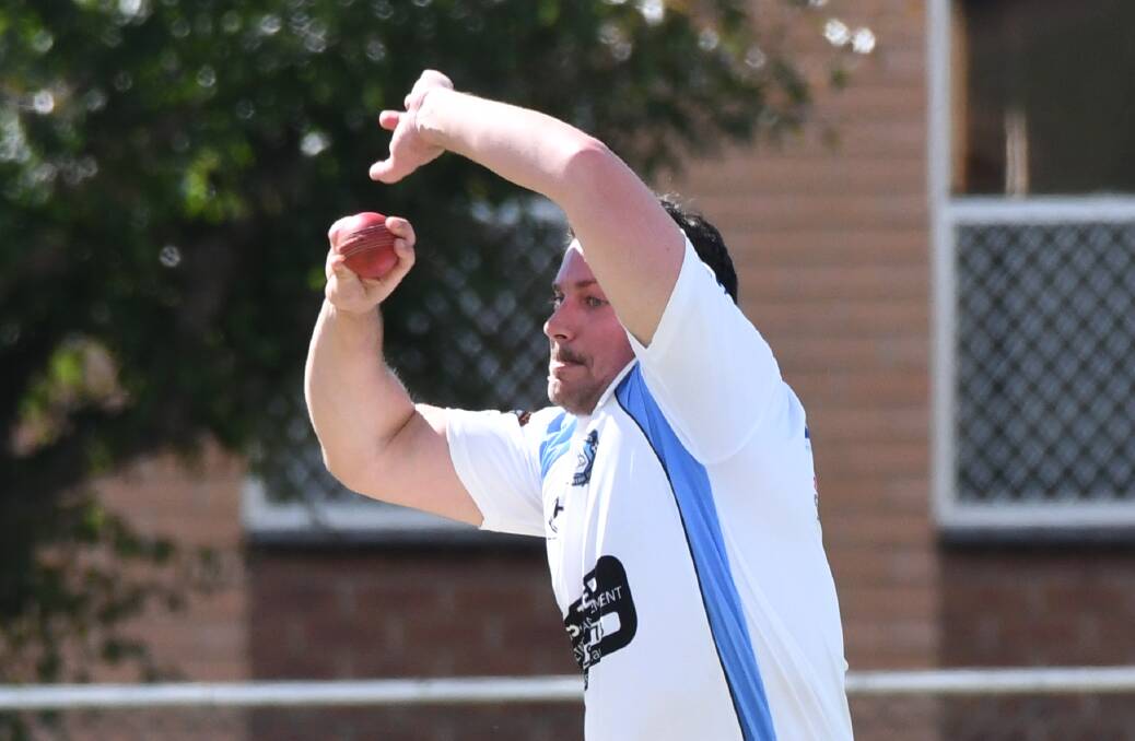 COLTS HANG ON: City Colts' Dave Giorgio prepares to deliver against St Pat's Old Boys on Saturday. Photo: CHRIS SEABROOK