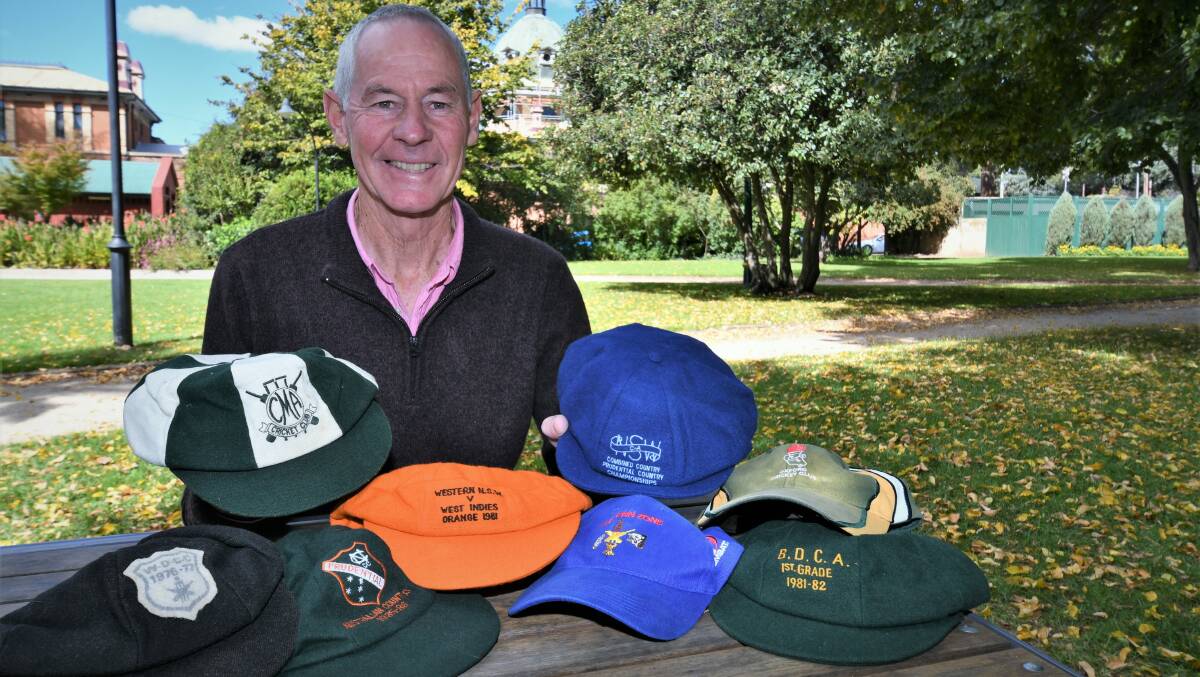 QUITE THE COLLECTION: Greg Griffith, added to the BDCA hall of fame, displays a career's worth of caps. Photo: CHRIS SEABROOK