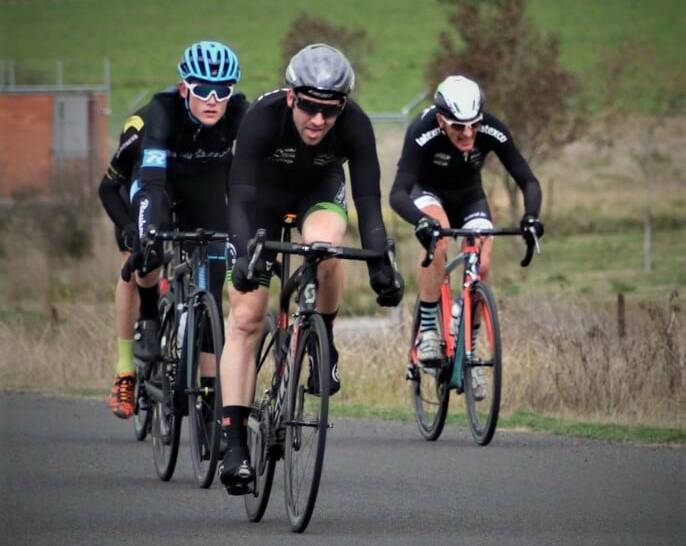 BUNCH OF FOUR: Craig Hutton leads home the sprint finish ahead of Luke Tuckwell (left), Jeremy Ryan (left, hidden) and Mark Windsor (right). Photo: KERRYN WINDSOR