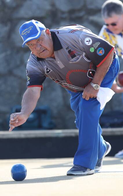 ROLLING: Geoff Thorn hopes for the best with this recent effort at the Bathurst City Bowling Club. Photo: PHIL BLATCH