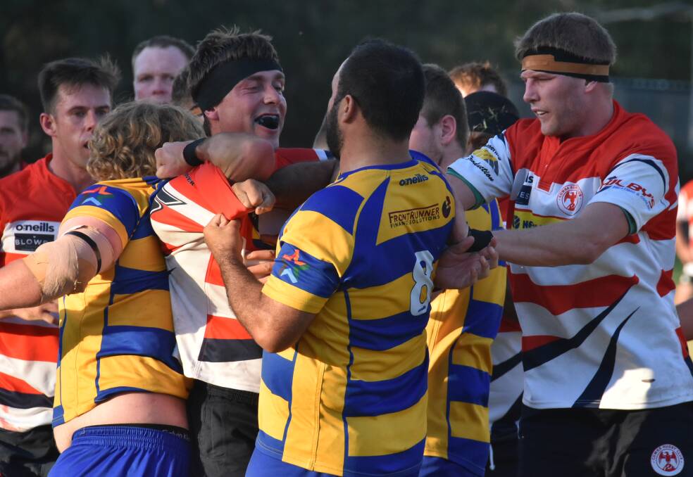 EMOTIONS RUNNING HIGH: Bathurst Bulldogs and Cowra Eagles players get into a scrap during Saturday's Blowes Clothing Cup clash. Cowra had the last laugh as they came out of the game 36-22 winners. Photo: ANDREW FISHER