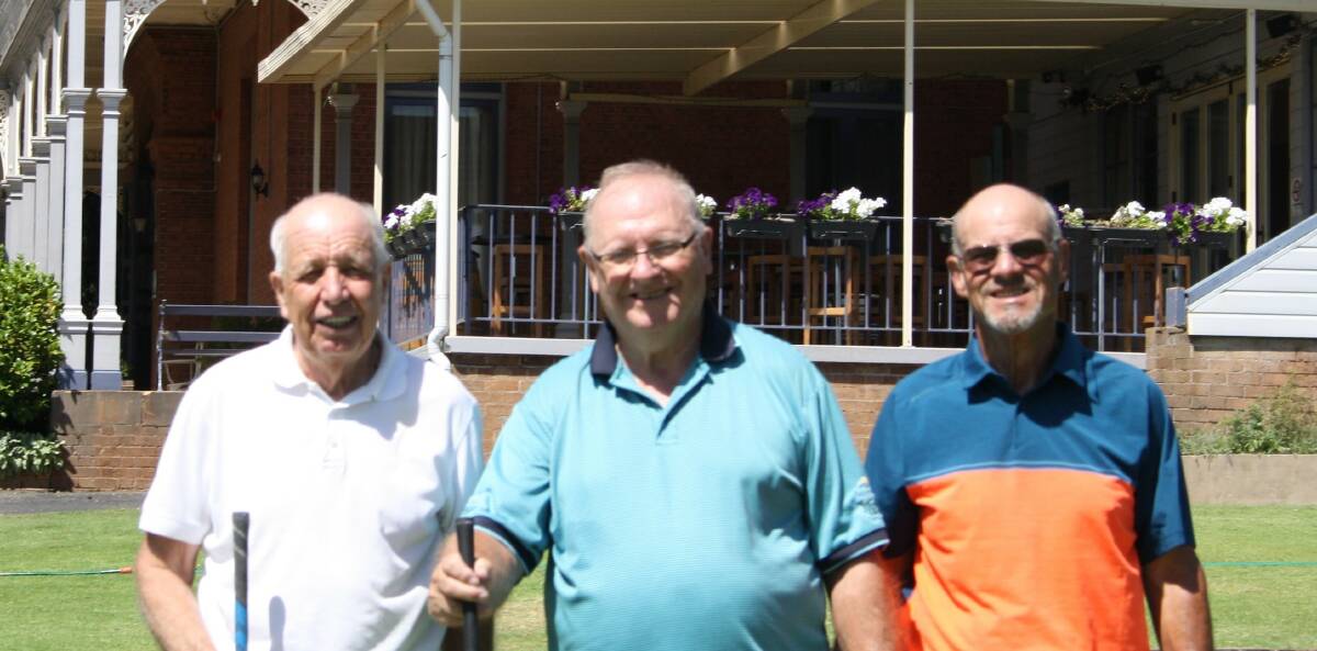UNDERWAY: Geoff Errey, Gary Kind and Dan Crossman ready to attack the Duntryleague course on Monday.